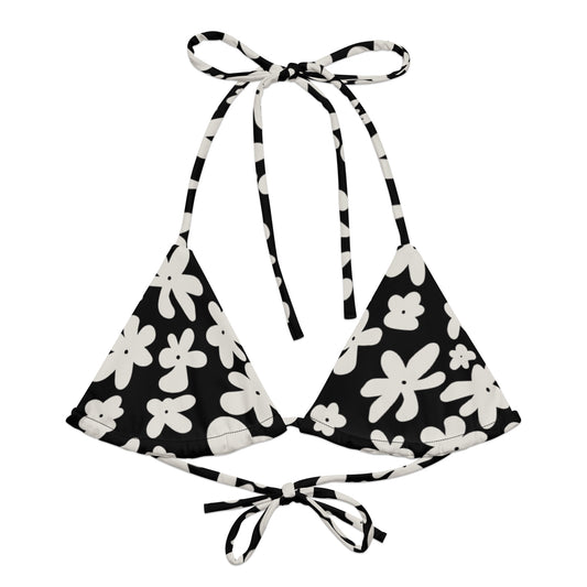 A stylish and comfortable bikini top called the Midnight Flower Bikini Top, made from recycled polyester with UPF 50+ sun protection. This flattering top features a black and white floral print and comes in a wide range of sizes, from XS to 6XL, to ensure