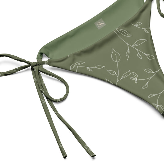 An eco-friendly bikini set crafted from high-quality, recycled materials. The Olive Ivory Bikini Set offers a flattering silhouette in a stylish olive and ivory color combination. With UPF 50+ sun protection, this bikini set is perfect for enjoying the ou